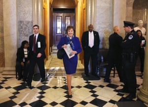 U.S. Sen. Dianne Feinstein walks off the Senate floor after speaking about the CIA on March 11, 2014 in Washington, DC.