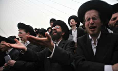 Ultra-Orthodox Jews attend a mass anti-draft rally in Jerusalem