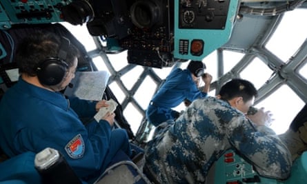 Crew members of Chinese Air Force search the sea areas where the missing Malaysia Airlines flight MH370 lost contact. Multinational search operation to locate missing Malaysia Airlines flight MH370 has been expanded to two areas with more countries joining in on the mission.
