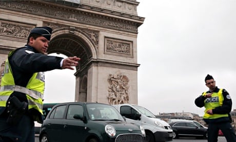 Police on the streets of Paris, on the lookout for cars with number plates that end in even numbers