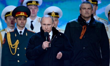 Vladimir Putin speaks at a rally