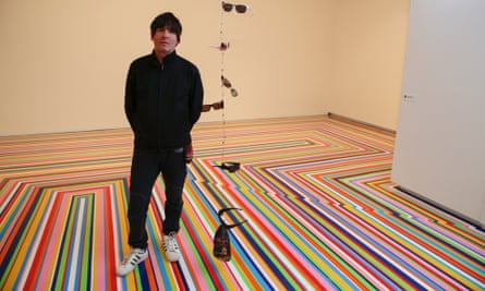 Jim Lambie with his work Screamadelica at the Museum of Contemporary Art, Sydney.