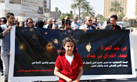 A demonstration against the draft of the "Al-Jafaari" personal status law. The sign reads, "Women ar