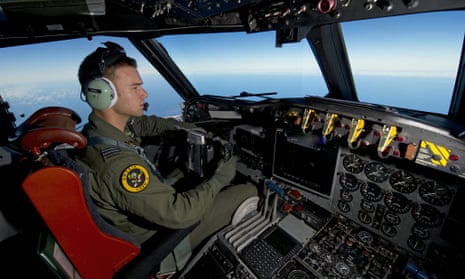 Royal Australian Air Force pilot, Flight Lieutenant Russell Adams steering his AP-3C Orion over the Southern Indian Ocean during the search for missing Malaysia Airlines flight MH370.