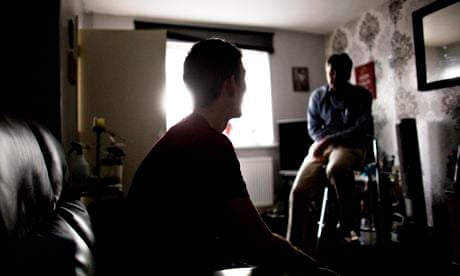 a mental health worker visiting a patient at home