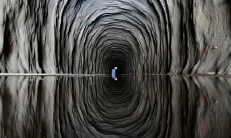A worker is seen inside the Cuncas II tunnel near Mauriti
