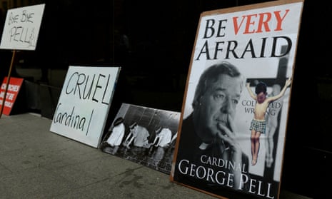 Anti-Pell placards outside the royal commission in Sydney
