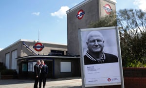 A poster of Bob Crow is seen outside Wanstead tube station before his funeral procession in east London.