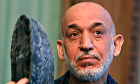 Afghanistan's President Hamid Karzai speaks during a joint news conference with Pakistan's Prime Min