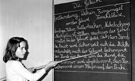 A primary schoolgirl at the blackboard in Hamburg, Germany, December 1968  