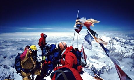 Climbers on summit of Mount Everest. Long, angry queues can form at peak season with two hour waits