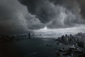 Clouds build up over the Victoria harbour before a storm in Hong Kong