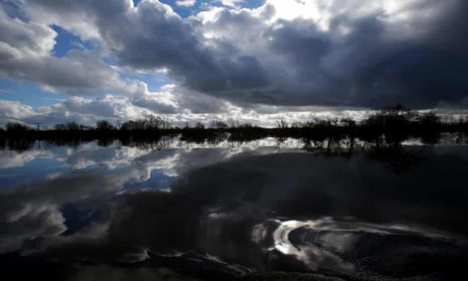 Flood water surrounds the flooded and largely evacuated village of Moorland on the Somerset Levels