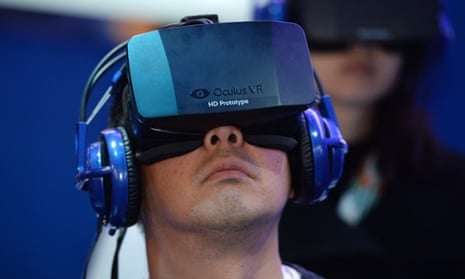 A CES attendee wears an Oculus Rift headset.
