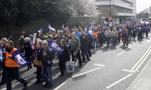 Teachers and students take part in a National Union of Teachers march in Chelmsford, Essex.