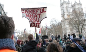 Banner reading "Careful what you cut" during the NUT march in central London.