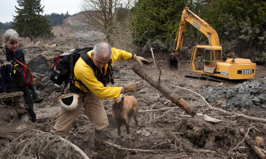The mudslide occurred when the rain-soaked side of a mountain in Snohomish County broke free and slammed into the homes, highway and a river below.