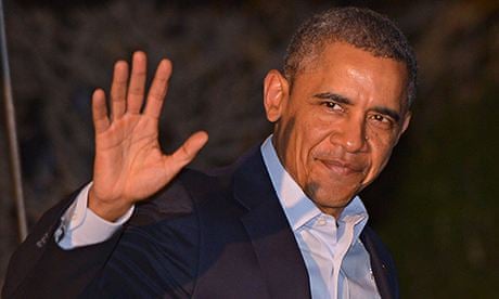 US President Barack Obama waves