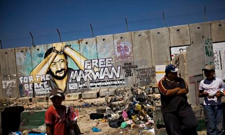 Graffiti of jailed Palestinian Fatah leader Marwan Barghouti in the West Bank town of Kalandia.