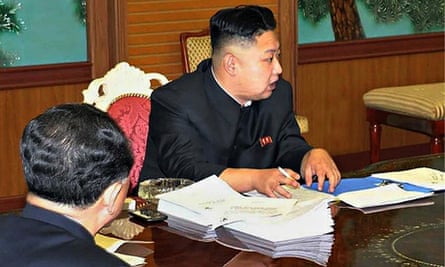 Kim Jong-un with phone