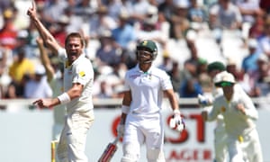 Australia's Ryan Harris celebrates taking the wicket of South Africa's JP Duminy during the third day of the third Test match at Newlands Stadium in Cape Town.