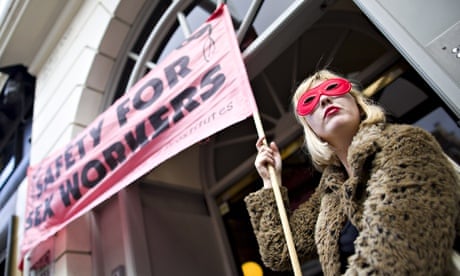 Sex workers and their supporters participate in a demonstration