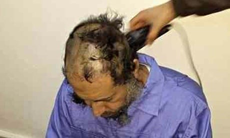 Saadi Gaddafi has his head shaved in a prison in Tripoli, Libya