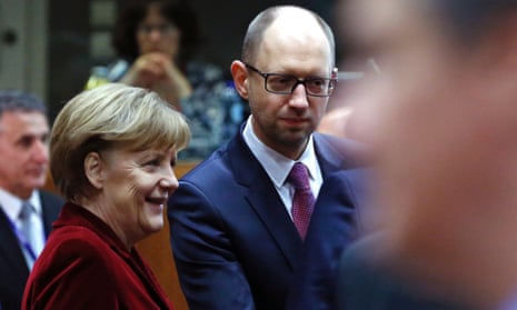 Germany's chancellor Angela Merkel and Ukraine's prime minister Arseniy Yatsenyuk at a European leaders emergency summit in Brussels