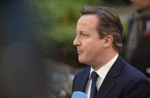 British Prime Minister David Cameron speaks to media upon his arrival at EU-Ukraine head of states Summit at the EU headquarters on March 6, 2014 in Brussels, Belgium.