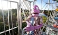 Randy (performed by Heath McIvor) rides the ferris wheel in the Garden of Unearthly Delights
