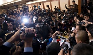 Malaysia Airlines representatives speak to the media at a hotel in Beijing.