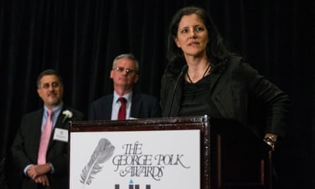 Investigative reporter Laura Poitras accepts the George Polk Award alongside Barton Gellman, far left, and Ewen MacAskill.