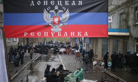 Armed pro-Russian activists occupy the police station carrying riot shields in Slovyansk. ukraine