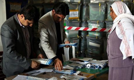 Afghan election workers count ballots in Kabul. 