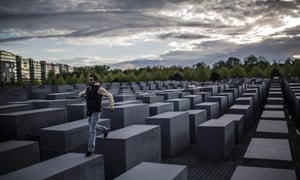A tourist is seen at the Holocaust Memorial, in  Berlin, Germany.