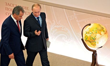 President Vladimir Putin with Russia's defence minister Sergei Shoigu.
