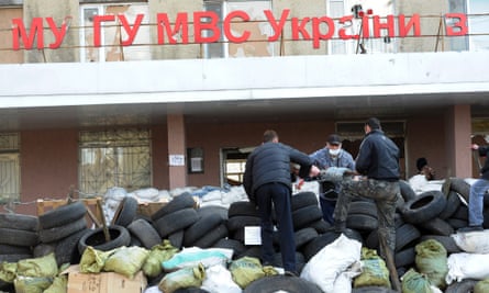 People building barricades outside the main police office in the town of Horlivka in the Donetsk region of eastern Ukraine.