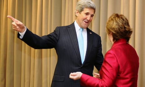 US Secretary of State John Kerry and EU foreign policy chief Catherine Ashton pose before a meeting on April 17, 2014 in Geneva