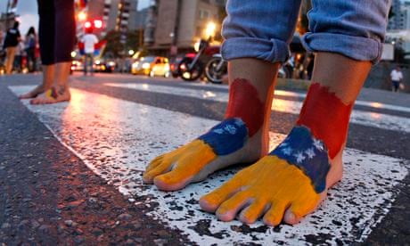 Student protesters march barefoot in Caracas