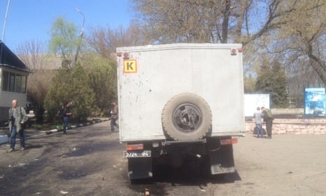 Ukrainian forces say they were fired on from outside; show off bullet holes from incoming fire