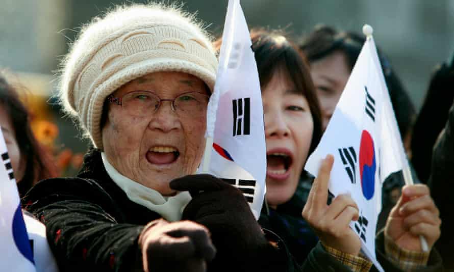 North Korean defectors take part in a anti-North Korea protest in Seoul