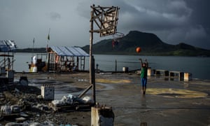 A boy plays basketball in Tacloban, Leyte, Philippines.