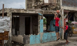 Two boys play basketball in Tacloban, Leyte, Philippines.