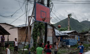 Boys play basketball in Tacloban, Leyte, Philippines.