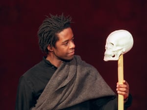 actor Adrian Lester playing the role of Hamlet rehearses a scene of William Shakespeare's tragedy "Hamlet" directed by British Peter Brook at the Bouffes du Nord theater in Paris 24 November 2000.