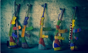 A photograph from Ralph Ziman's exhibition Ghosts Zimbabwean craftsmen made replica AK47 guns from wire and beads for Ghosts, a new exhibition opening in Cape Town this week
