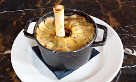 Lamb shank hotpot with bone sticking up at the Plum and Spilt Milk
