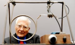 Scientist and inventor James Lovelock, 94, sits with one of his early inventions, a homemade Gas Chromatography device