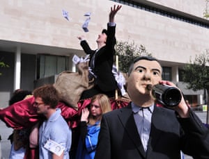 Protesters stage a demonstration near the venue of the Barclay's Bank's annual general meeting.