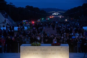 Crowds disperse after the Anzac dawn service at The Australian War memorial in Canberra this morning